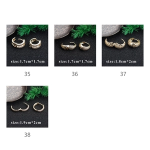 Detailed comparison of four 18k gold plated earring hoops with cubic zirconia settings
