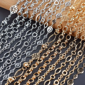 Detailed close-up of mixed gold and silver plated DIY jewelry chains in various link styles