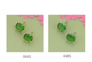 Detail van rechthoekige smaragdgeslepen glazen oorbellen met goud- en zilveren zetting