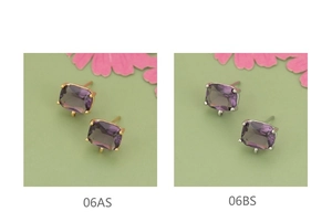 Detail van 18k vergulde paarse glazen oorstekers voor DIY-sieraden maken project