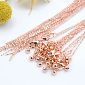 Roségoldene DIY-Kreuzkette mit Schiebeperlen und Nadel für verstellbare Halsketten