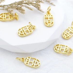Gouden holle ovale hanger met traditioneel patroon voor DIY-sieradenaccessoires