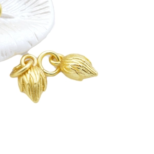 Golden lotus seed pendant DIY jewelry accessory with intricate textured metal details