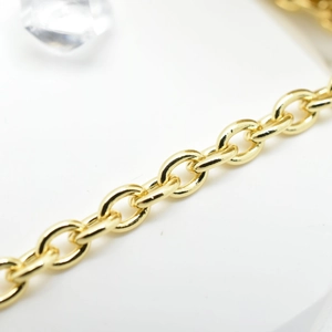 Golden chunky O-link chain DIY accessory with high-shine 18k gold plating on white background