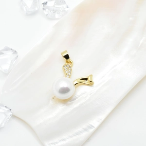 Starfish pearl pendant with rabbit ear design and gold-plated micro-pave setting