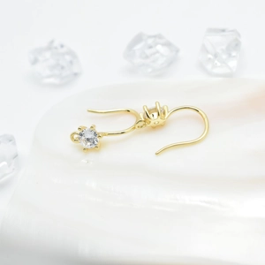 Minimalist gold plated drop earrings with sparkling cubic zirconia and pearl shell base