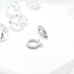 Silver drop-shaped 18k gold plated jewelry clasps with micro-pave cubic zirconia crystals