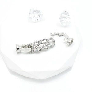 Silver infinity knot necklace connector clasp with shimmering cubic zirconia micro-pave