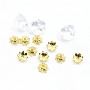 Detailed view of 18k gold plated hollow flower bead caps for DIY jewelry making