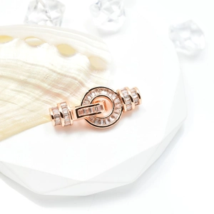 Rose gold round toggle clasp for pearl necklaces with sparkling cubic zirconia inlay