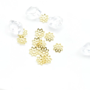 Group of golden 18k plated hollow flower bead caps for DIY jewelry making and bracelets