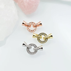 Chiusure OT con zirconi micro-pave in oro rosa, oro e argento per gioielli