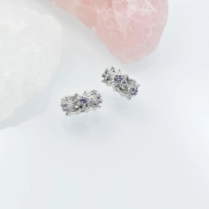Silver flower earrings featuring central purple stones and white sparkling zircon accents