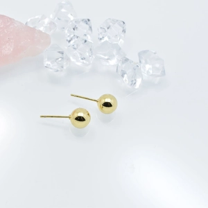 Boucles d'oreilles boules creuses plaquées or 18 carats avec finition miroir polie