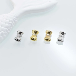 Bow-shaped zircon spacer beads in gold and silver finish for DIY jewelry making