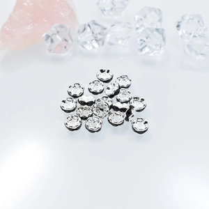 Pila de cuentas espaciadoras de plata de 6mm con borde ondulado para joyas de bricolaje