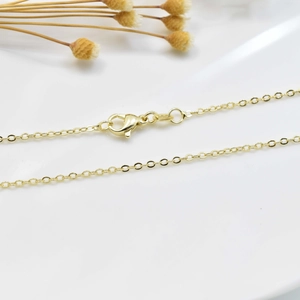Minimalist 18K gold plated necklace with lobster clasp shown on a clean white background