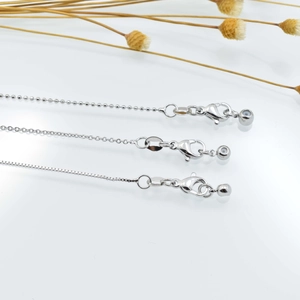 Adjustable silver DIY jewelry chains in bead, cross and box styles with lobster clasps