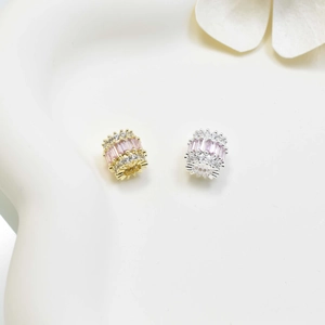 Zircon cylinder bead pendant in gold and silver finish with pink rectangular gemstone