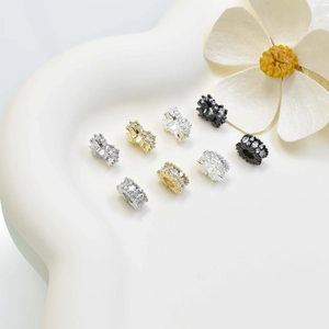 Gear-shaped jewelry spacers with cubic zirconia in gold, silver and gun black finishes