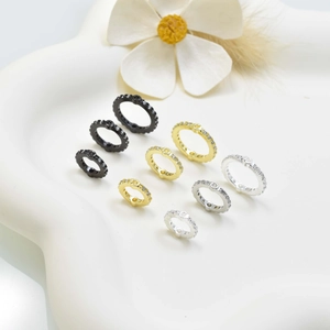 DIY jewelry circle beads with pave crystals in black, gold, and silver finishes