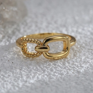 Elegant gold asymmetric lock ring with polished and twisted striped textures for women