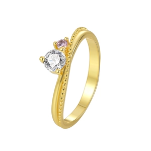 Elegant gold wavy ring featuring large white zircon and pink gemstone in a claw setting