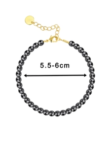 Detail view of hematite bead bracelet with 5.5-6cm adjustable gold lobster clasp