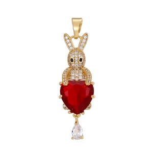Golden bunny pendant with red heart gemstone and micro-paved cubic zirconia accents