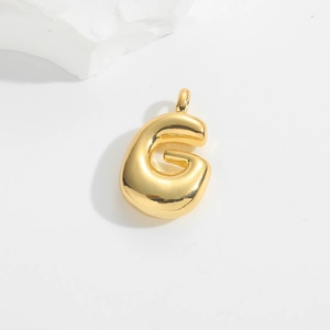 Polished gold bubble letter G pendant with glossy mirror finish on a clean white background