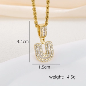 Detail of 18k gold letter U pendant with zircon inlay showing size 3.4cm and 4.5g weight