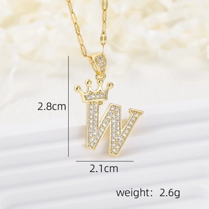 Detail view of gold crown letter W pendant showing dimensions 2.8cm by 2.1cm