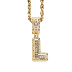 Macro shot of iced-out gold letter L pendant with rectangle baguette-cut zircons