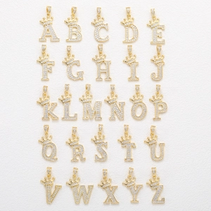 Golden crown initial pendants A-Z set with micro-paved cubic zirconia crystals