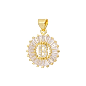 Detail of 18k gold plated letter B pendant with zircon pavé setting and baguette stones