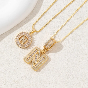 Gold-plated letter N necklace variant with full cubic zirconia pave in 3D and round design