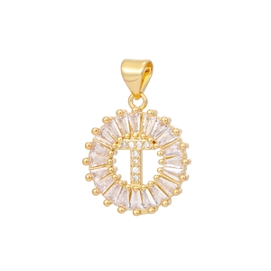 Detail of 18k gold plated letter T pendant with baguette-cut zircons and pave setting