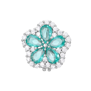 Macro view of flower pendant featuring pear-cut light blue stones and white crystal halo