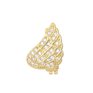Detailed close-up of a 10mm golden wing charm with micro-paved zircons and hinge clip