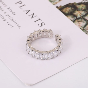 Adjustable silver ring with baguette-cut zircons in a vintage eternity band style