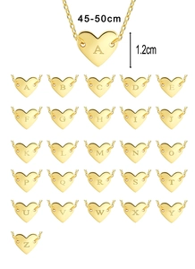 Macro detail of heart pendant necklace with A-Z letters and 45-50cm chain dimensions