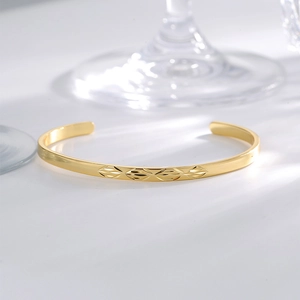 Minimalist gold open cuff bracelet with geometric diamond engraving for women