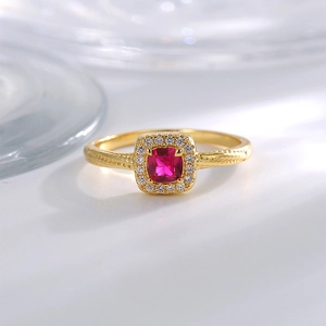 Exquisite gold-plated ring with a square red gemstone and white zircon halo setting