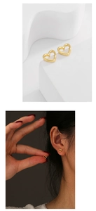 Detail showing gold heart-shaped stud earrings and model wearing the elegant jewelry