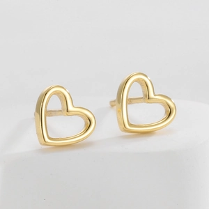 Minimalist S925 silver hollow heart stud earrings in polished gold finish