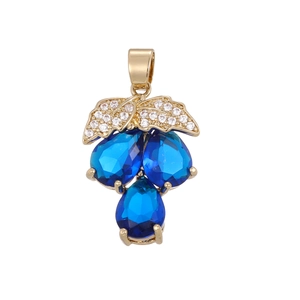 Detailed view of grape pendant with blue pear-shaped crystals and sparkling zircons
