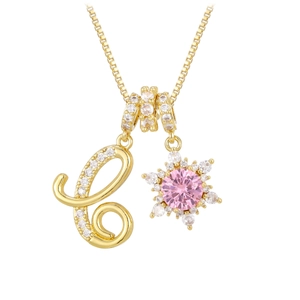 Gold plated initial C and pink snowflake pendant set with micro-paved zircons and box chain