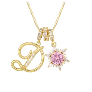 Golden necklace with letter D and cubic zirconia snowflake pendant with pink stone
