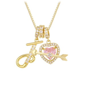 Macro shot of 18K gold plated heart pendant with pink gemstone and letter J detail