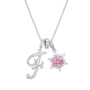 Detail view of silver box chain with letter F pendant and pink gemstone floral charm